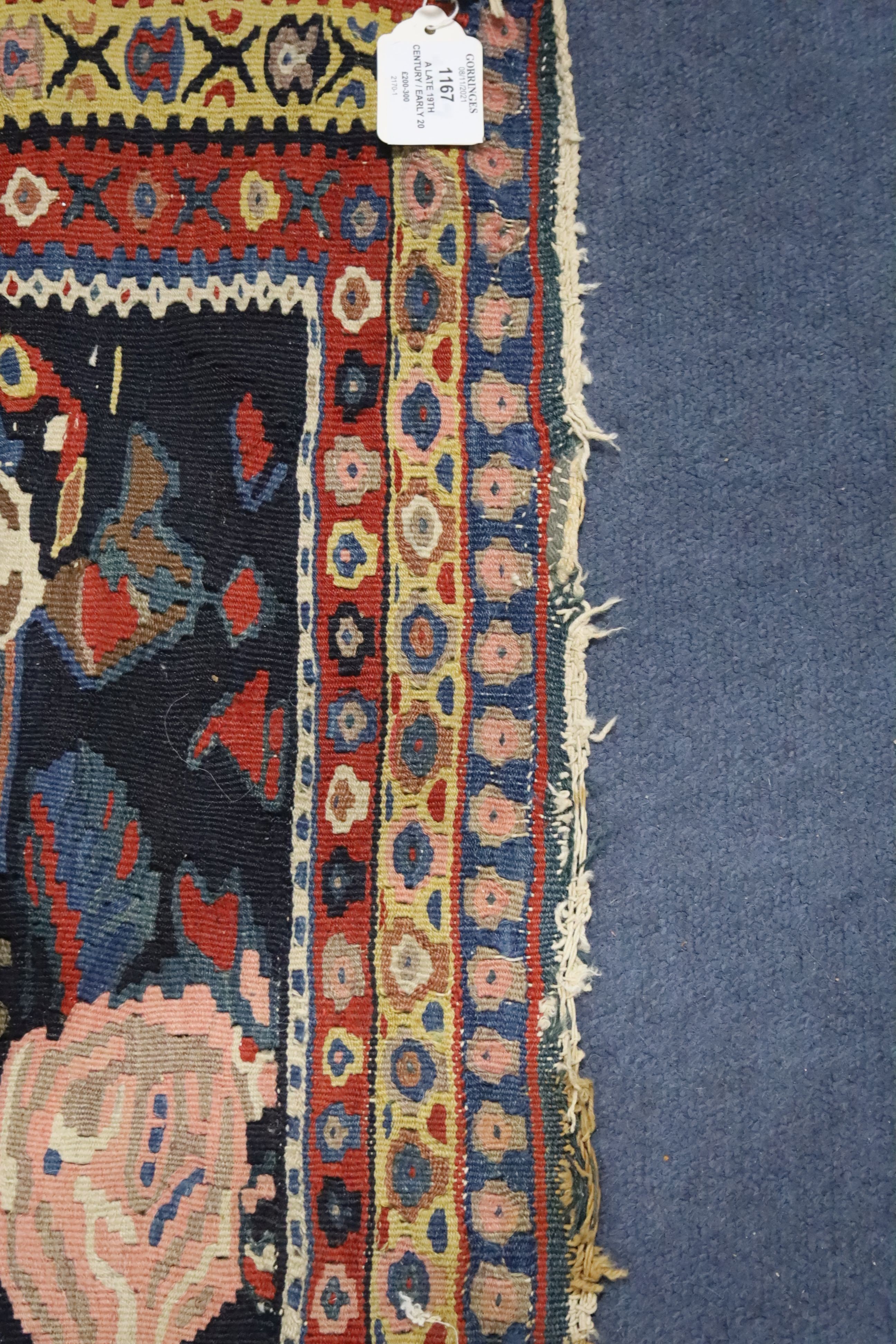 A late 19th century / early 20th century Senneh polychrome Kilim rug, 190 x 130cm